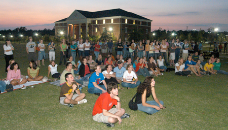 Students gathered on the Great Lawn during SAC's Welcome Back Concert featuring Micah Dalton and Josh Wilson. - Photo by Brad Moore