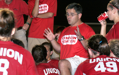 Union head coach Brandon Boylan give some halftime instructions during a match in Union's first season of varsity competion. - Photo by Kyle Kurlick