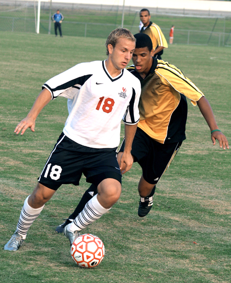 Christopher Prentice attempts to keep possession of the ball during a match at Union. - Photo by Kyle Kurlick