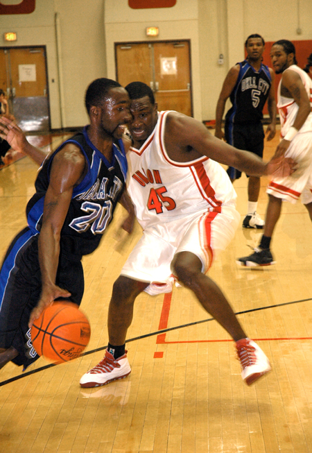 Corey Burkett (45), Union senior, plays tough defense in a game versus Oklahoma City University. - Photo by Brad Moore