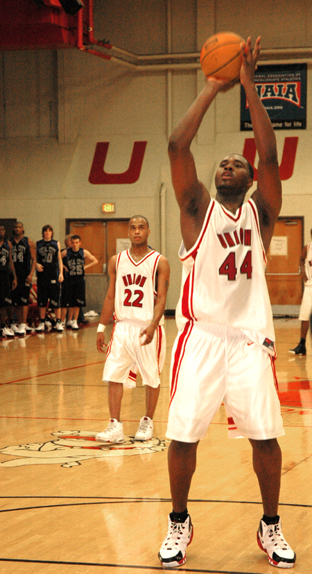 Pierry Valmera, Bulldog center, shoots a free throw in a game versus the Oklahoma City University Stars. - Photo by Brad Moore