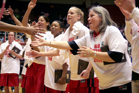 The Lady Bulldogs receiving their plaques after winning a second straight NAIA Championship title. - Photo by Kyle Kurlick