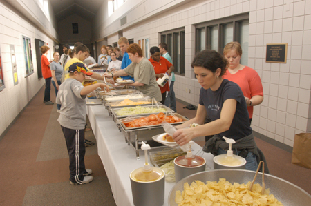 Lunch was served by ARAMARK Sunday afternoon in the hallway of the Barefoot Student Union Building for the students and those helping with the tornado clean-up. - Photo by Jim Veneman