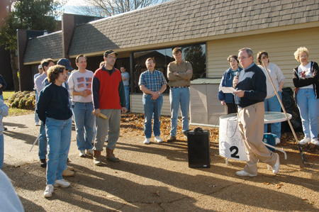 President David S. Dockery lets the faculty & staff volunteers know the extent of the tornado damage and begins to assign teams to various areas of the campus for clean-up. - Photo by Jim Veneman