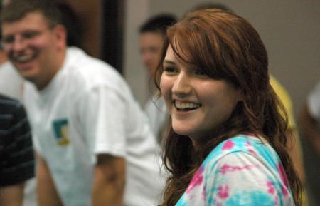 Junior Renee Roberson enjoys hearing Bryan Emerson perform at open mic night.  - Photo by Matthew Diggs
