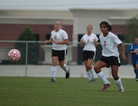 Cynthia Medina (3) moves toward the ball as she looks down field for open teammates.   - Photo by Steven Aldridge