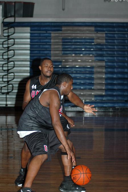 Brian Lake drives against Pierry Valmera during a Bulldog practice. - Photo by Holly Gushee