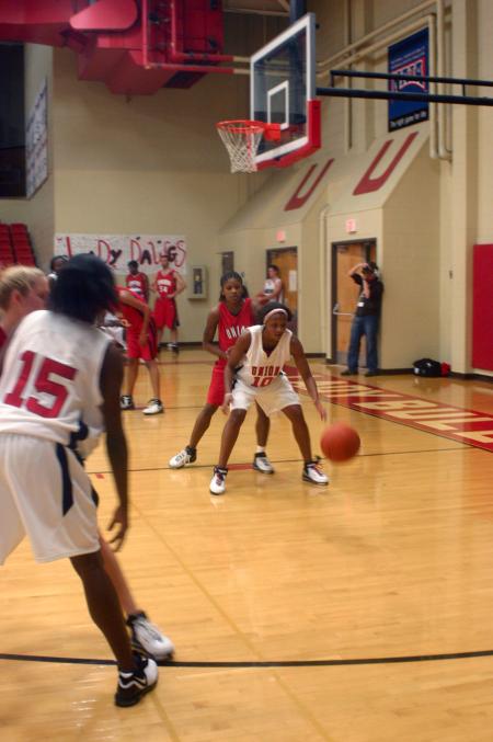 Senior LaTorya Fuller passes the ball to Senior Ena Daniels during a Bulldog Madness scrimmage. - Photo by Stephanie Schroeder