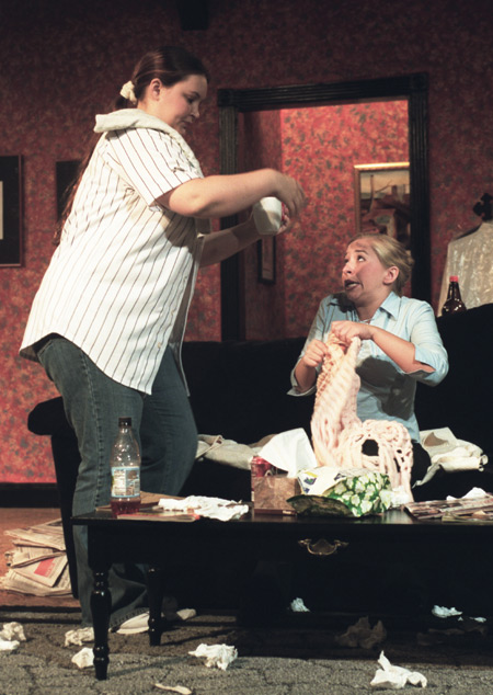 Lindsey Garner brings Miranda Wallace coffee during <i>The Odd Couple.</i> - Photo by Jim Veneman