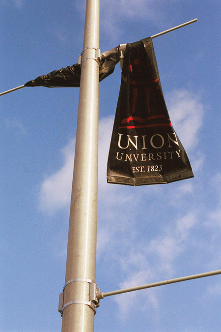 New banners that had lined the campus during the fall semester were found in various states of disrepair after the tornado. - Photo by Kristen Hiller