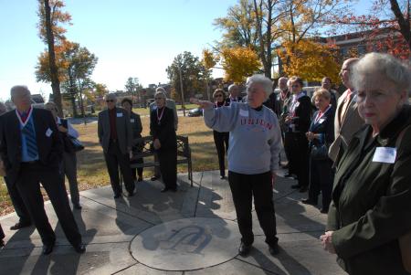 Ramona Mercer leads the Class of 1957 in a tour of the old Union campus during Homecoming. - Photo by Morris Abernathy