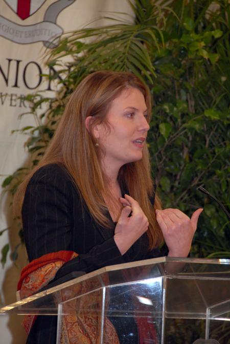 Andrea Leigh McDaniel accepts the Outstanding Young Achiever Award at the Alumni Awards Dinner at Homecoming. McDaniel is a 1999 Union graduate, majoring in religion and philosophy, who serves at the U.S. Department of State as the Deputy White House Liaison. She previously worked at the White House in the Office of Presidential Personnel for about two years.  - Photo by Morris Abernathy