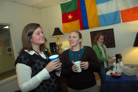 Language alums Laura Tidenberg & Ally Martin fellowshipped during a reception at Homecoming.  Also pictured is Molly Sills. - Photo by Morris Abernathy