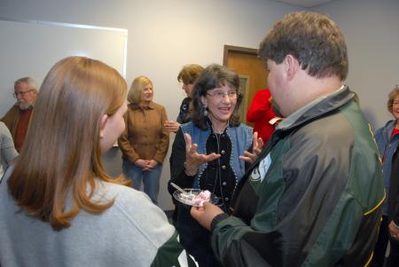 Sandra Hathcox fellowships with Michelle & Trevor Yarbrough during the school of education's Homecoming reception. - Photo by Morris Abernathy