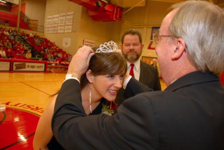 Union President David S. Dockery crowns senior Lindsey Abell as Homecoming queen. - Photo by Morris Abernathy