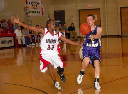 Sophomore transfer Tony Brown (33) plays defense in Saturday's Homecoming game versus Olivet Nazarene University (Ill.). - Photo by Morris Abernathy