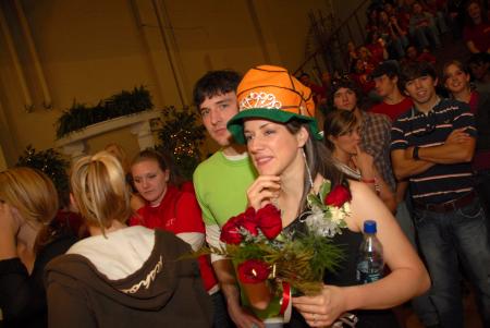 Lindsey Abell dons both her Homecoming Queen tiara and her basketball hat during the basketball game. - Photo by Morris Abernathy