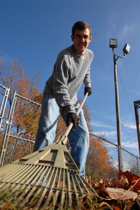 Will Trautman helps out at the YMCA in east Jackson during Day of Remembrance. - Photo by Morris Abernathy