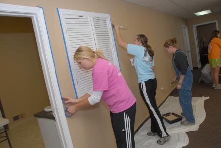Beth McDowell, Elizabeth Hyndman and Kasey Nunn help out at Birth Choice in Jackson during Day of Remembrance. - Photo by Morris Abernathy