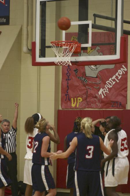 Both teams wait in anticipation as a shot goes up during the Lady Bulldogs' Homecoming game against St. Gregory's University (Okla.). - Photo by Stephanie Schroeder
