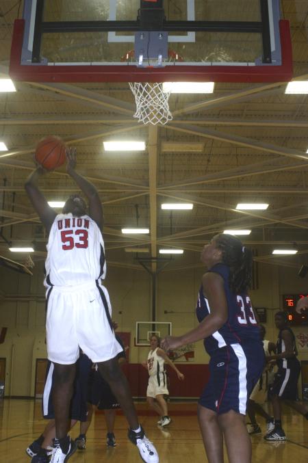 Junior D.J. Sissoko takes a shot in the Homecoming game against St. Gregory's University, Okla. - Photo by Stephanie Schroeder