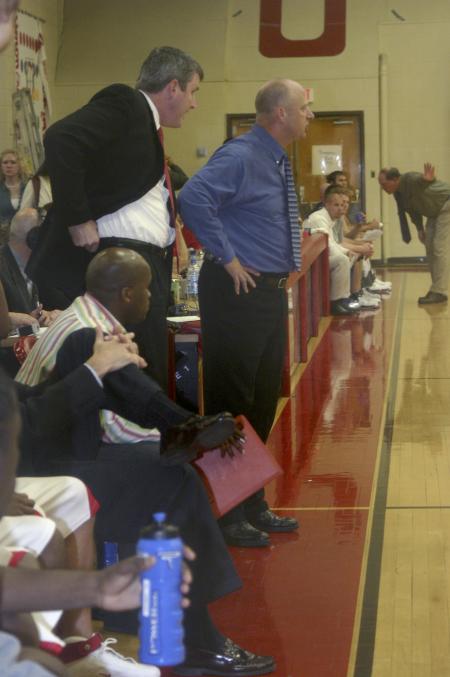 Assistant Coach David Niven and Head Coach Ralph Turner give instructions from the sidelines during the Bulldogs' Homecoming game against Olivet Nazarene University, Ill. - Photo by Stephanie Schroeder