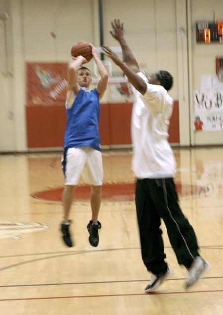 Alvin Jeffery takes a shot against Bulldog Mack Bealim in the Joes vs. the Pros event during Homecoming. - Photo by Matthew Diggs