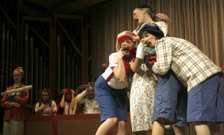 The Union University Players present the children's play <em>The Trial of the Big Bad Wolf</em> in the chapel. Ashley Dieham, Kali Wagner, Emily Watlington and Caitlin Riggs re-enact the sad day of the three pigs leaving thier mother. - Photo by Kyle Kurlick