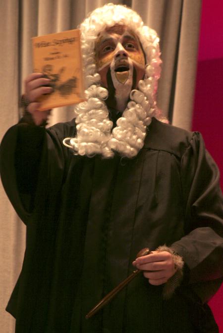 Jonathan Lambach plays the wise old owl judge during the Union University Players production of <em>The Trial of the Big Bad Wolf</em>. - Photo by Kyle Kurlick