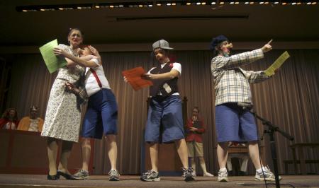 From Right: Ashley Diehm, Kali Wagner, Caitlin Riggs and Emily Watlington re-enact for the jury the wolf's side of the story in the Union University Players production of <em>The Trial of the Big Bad Wolf</em>. - Photo by Kyle Kurlick