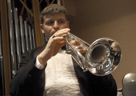 Freshman Joel Lawson, Christian studies major, warms up before the symphonic band concert. - Photo by Matthew Diggs