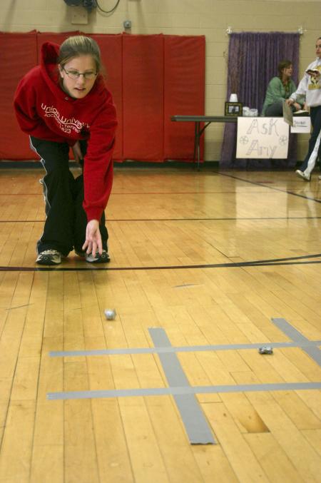 Barbara Reynolds plays a tic-tac-toe game at the carnival during Frost Fest put on by SAC. - Photo by Stephanie Schroeder