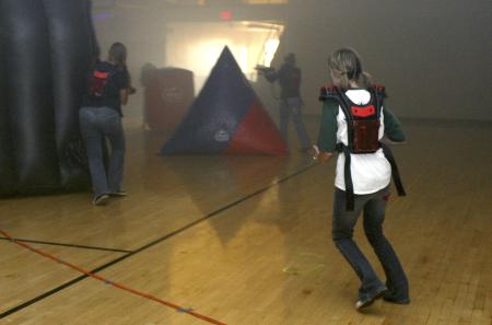 Kasey Cobb and other students play laser tag held in the small gym as part of Frost Fest put on by SAC. - Photo by Stephanie Schroeder