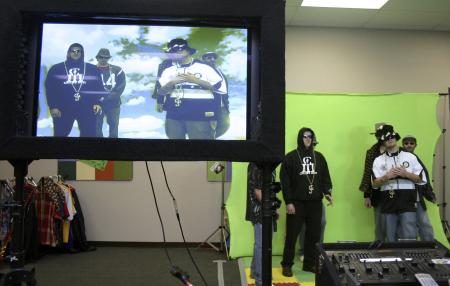 Matthew Kingsley, Jared Nolen, Aaron Gilbert and Nathan Cobb make a music video held in the Student Lounge during Frost Fest put on by SAC. - Photo by Stephanie Schroeder