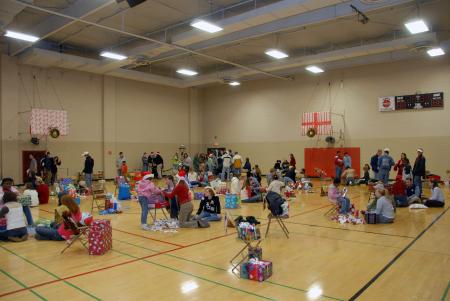 Union groups bought Christmas presents and presented them to children at the SAC Carl Perkins' Christmas Party. - Photo by Morris Abernathy