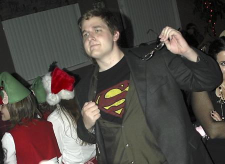 Junior Tyler Whetstone, journalism major, is ready to save the day at the annual costume coffe house held in Hurt commons. - Photo by Matthew Diggs
