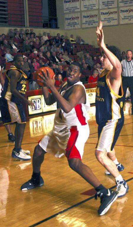 Bulldog Pierry Valmera grabs a rebound during a game against Mid-Continent University, Ky. - Photo by Matthew Diggs