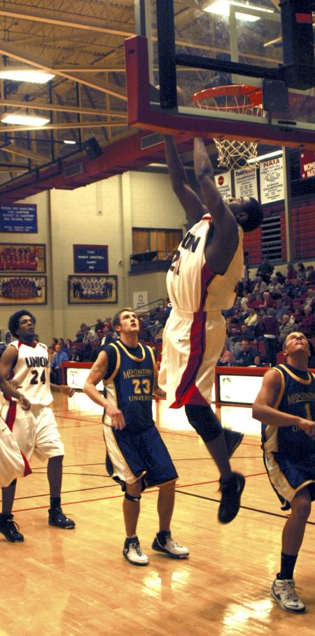 Bulldog Brian Lake reaches for the basket during a game against Mid-Continent University Ky. - Photo by Matthew Diggs