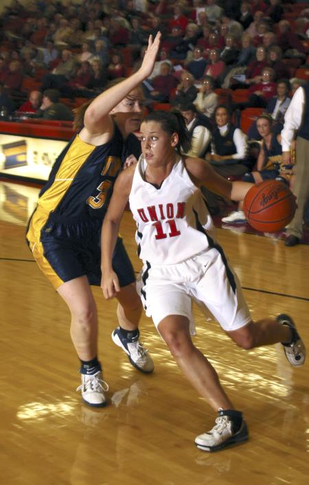 Lady Bulldog Kaitlin Dudley breaks through the defense of Blue Mountain College, Miss. - Photo by Matthew Diggs