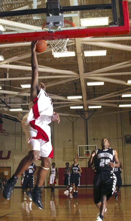 Bulldog Brian Lake goes to the hoop during a game against Crichton College.  - Photo by Matthew Diggs