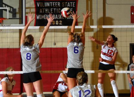 Senior Elena Villagomez attemps to split the defenders. - Photo by Morris Abernathy