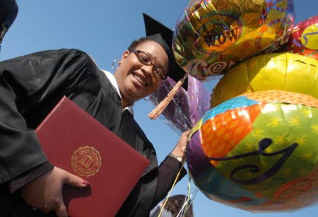 Nursing graduate Vivian McKay Odum of Germantown, TN  celebrates just after the December graduation service at Union University.                               - Photo by Jim Veneman