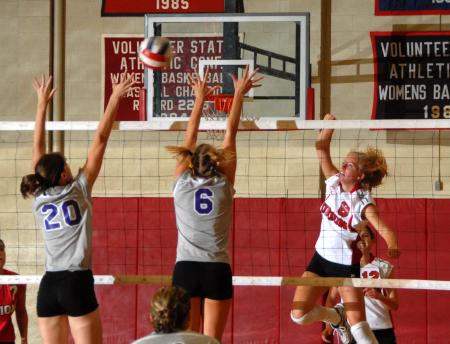 Lady Bulldog sophomore Amanda Hutchison goes for a kill. - Photo by Morris Abernathy