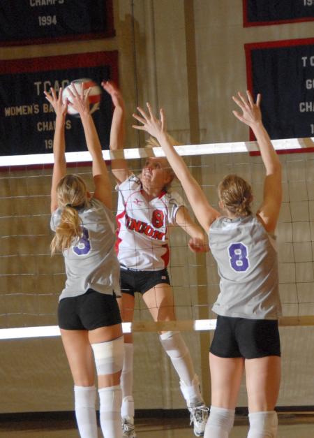 Sophomore Amanda Hutchison spikes the ball. - Photo by Morris Abernathy