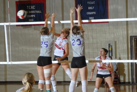 Lindsay Holmes, Union senior, spikes the ball. - Photo by Morris Abernathy