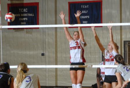 Junior Kelly Huffines (3) blocks a shot. - Photo by Morris Abernathy
