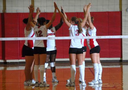 The Union Bulldogs huddle before a game. - Photo by Morris Abernathy