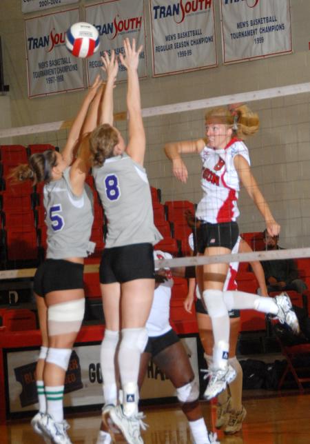 Sophomore Amanda Hutchison goes for a kill. - Photo by Morris Abernathy