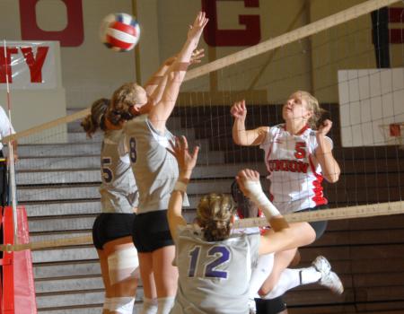 Senior Lindsay Holmes returns the ball. - Photo by Morris Abernathy