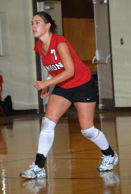 Junior Lindsey Wallach gets set for the next serve. - Photo by Morris Abernathy